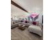 Spacious living room with a large sectional sofa and stylish decor, ideal for comfortable lounging and entertaining at 12835 N 78Th St, Scottsdale, AZ 85260