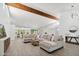 Bright, open living room boasts high ceilings, a large sectional sofa, and stylish decor at 12835 N 78Th St, Scottsdale, AZ 85260