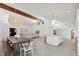 Spacious open-concept living space with a dining area, kitchen island, and comfortable seating at 12835 N 78Th St, Scottsdale, AZ 85260