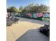 A patio featuring an outdoor wall with colorful Valentine's Day themed graffiti at 12835 N 78Th St, Scottsdale, AZ 85260