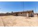 A spacious backyard offers endless possibilities for outdoor activities, featuring a covered patio for outdoor living at 1545 W 7Th Ave, Mesa, AZ 85202
