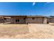 The backyard features a covered patio and plenty of space for outdoor activities and entertaining at 1545 W 7Th Ave, Mesa, AZ 85202