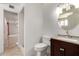 Bright bathroom with a dark wood vanity and granite countertop at 1545 W 7Th Ave, Mesa, AZ 85202