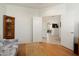 Open living area featuring hardwood floors and a doorway leading to other parts of the home at 17653 W Ingleside Dr, Surprise, AZ 85374
