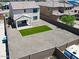 This backyard features an easily maintained desert landscaped yard with a patch of artificial turf at 19889 W Annika Dr, Litchfield Park, AZ 85340