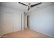 Spacious bedroom featuring a closet and neutral carpet, offering a blank canvas for personalization at 19889 W Annika Dr, Litchfield Park, AZ 85340