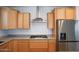 Close up view of kitchen featuring stainless steel appliances and granite countertops at 19889 W Annika Dr, Litchfield Park, AZ 85340