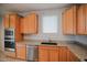 Kitchen features granite countertops, stainless steel appliances and tile floors at 19889 W Annika Dr, Litchfield Park, AZ 85340
