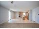 Open-concept kitchen with an island, stainless steel appliances and tile floors at 19889 W Annika Dr, Litchfield Park, AZ 85340