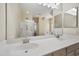 Bright bathroom with double sinks and large mirror at 21017 W Edith Way, Buckeye, AZ 85396