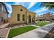 Inviting single-story home with well-manicured lawn and charming architectural details in a pleasant neighborhood at 21017 W Edith Way, Buckeye, AZ 85396