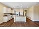 Well-appointed kitchen with white cabinetry, granite countertops, stainless steel appliances, and ample storage at 21017 W Edith Way, Buckeye, AZ 85396