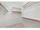 Walk-in closet with built-in shelving and ample storage space at 21017 W Edith Way, Buckeye, AZ 85396