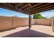 A spacious patio with a brick floor and brick fence at 2107 W Lane Ave, Phoenix, AZ 85021