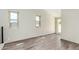Bonus room featuring tiled floors, natural light, and fresh white paint at 2107 W Lane Ave, Phoenix, AZ 85021