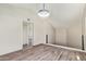 Bonus room featuring tiled floors, natural light, fresh paint, and modern light fixture at 2107 W Lane Ave, Phoenix, AZ 85021