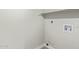 Laundry room with white walls, baseboards, and water connections at 2107 W Lane Ave, Phoenix, AZ 85021