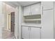 Mud Room features white cabinets and plenty of storage near the home's entryway at 2107 W Lane Ave, Phoenix, AZ 85021