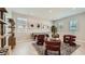 Spacious game room with ample natural light, a pool table, and stylish decor at 23113 E Saddle Way, Queen Creek, AZ 85142