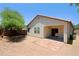 Backyard featuring a covered patio and stone pavers, perfect for outdoor entertaining at 2333 W Alta Vista Rd, Phoenix, AZ 85041