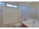 Bathroom features a shower-tub combination and single sink vanity at 2333 W Alta Vista Rd, Phoenix, AZ 85041