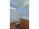 Bathroom with shower-tub combination and wood look flooring at 2333 W Alta Vista Rd, Phoenix, AZ 85041