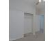 Bedroom with sliding closet doors and neutral carpet at 2333 W Alta Vista Rd, Phoenix, AZ 85041