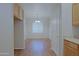 Dining room with wood floors and natural lighting, perfect for Gathering meals at 2333 W Alta Vista Rd, Phoenix, AZ 85041