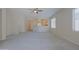 Spacious living room with neutral carpet, ceiling fan and lots of natural light at 2333 W Alta Vista Rd, Phoenix, AZ 85041