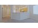 Open living area with kitchen view and versatile breakfast bar at 2333 W Alta Vista Rd, Phoenix, AZ 85041