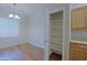 Large open pantry in dining area with wooden floors at 2333 W Alta Vista Rd, Phoenix, AZ 85041