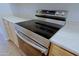 Close up of modern stainless steel stove top at 2333 W Alta Vista Rd, Phoenix, AZ 85041