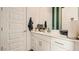Well-appointed bathroom with white cabinets, modern fixtures, and a clean, contemporary design at 2955 E Lucky Horseshoe Ln, San Tan Valley, AZ 85140