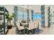 Bright dining area with a stylish table setting, large windows, and elegant decor at 2955 E Lucky Horseshoe Ln, San Tan Valley, AZ 85140