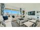 Bright living room with comfortable seating, contemporary decor, and large windows showcasing the view at 2955 E Lucky Horseshoe Ln, San Tan Valley, AZ 85140