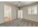 Spacious bedroom with a ceiling fan and a window, providing a calming and comfortable space at 29606 N Tatum N Blvd # 265, Cave Creek, AZ 85331