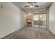 Cozy bedroom with soft carpet, ceiling fan and a sliding door to the balcony at 29606 N Tatum N Blvd # 265, Cave Creek, AZ 85331
