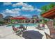 Inviting community pool with lounge chairs and umbrellas, perfect for relaxation at 29606 N Tatum N Blvd # 265, Cave Creek, AZ 85331