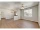 Spacious living room features wood flooring, ceiling fan, and natural light at 29606 N Tatum N Blvd # 265, Cave Creek, AZ 85331