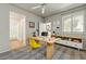 Bright home office with a large desk, plenty of storage, and natural light at 29606 N Tatum N Blvd # 265, Cave Creek, AZ 85331