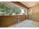 Private outdoor patio with tile flooring, privacy screen, and scenic views at 29606 N Tatum N Blvd # 265, Cave Creek, AZ 85331