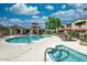 Community pool and lounge area offering residents relaxation and recreation at 29606 N Tatum N Blvd # 265, Cave Creek, AZ 85331