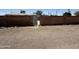 Backyard view between fenced walls at 324 E Riviera Dr, Tempe, AZ 85282