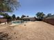 Spacious backyard featuring a pool and potential for landscaping at 324 E Riviera Dr, Tempe, AZ 85282