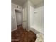 Bathroom featuring a shower-tub combination, closet and toilet at 324 E Riviera Dr, Tempe, AZ 85282