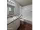 Bathroom with a tub and shower combination and a granite vanity at 324 E Riviera Dr, Tempe, AZ 85282