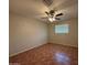 Bedroom with tile flooring and ceiling fan at 324 E Riviera Dr, Tempe, AZ 85282