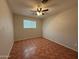 Bedroom with fan and tile flooring at 324 E Riviera Dr, Tempe, AZ 85282