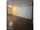 View of the interior of a two-car garage at 324 E Riviera Dr, Tempe, AZ 85282