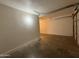 View of the interior of a two-car garage at 324 E Riviera Dr, Tempe, AZ 85282